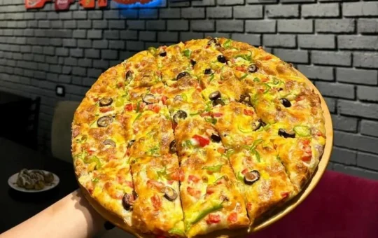pizza-yum-yum-image1-taqyeem.jpg